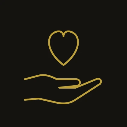 Gold line icon of a hand holding a heart